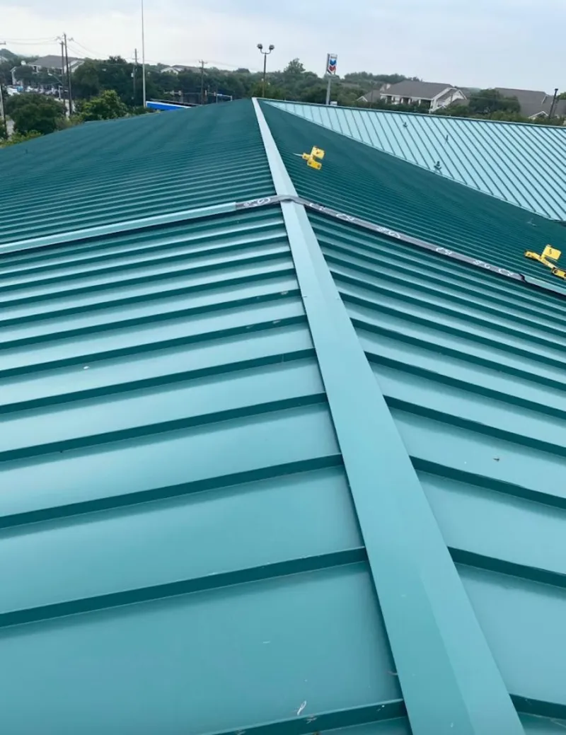 Green commercial metal roof ridge and valley for Metal Roof Repair in Celebration